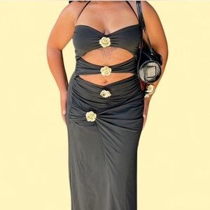 Elegant Black Cut-Out Dress with Floral Accents